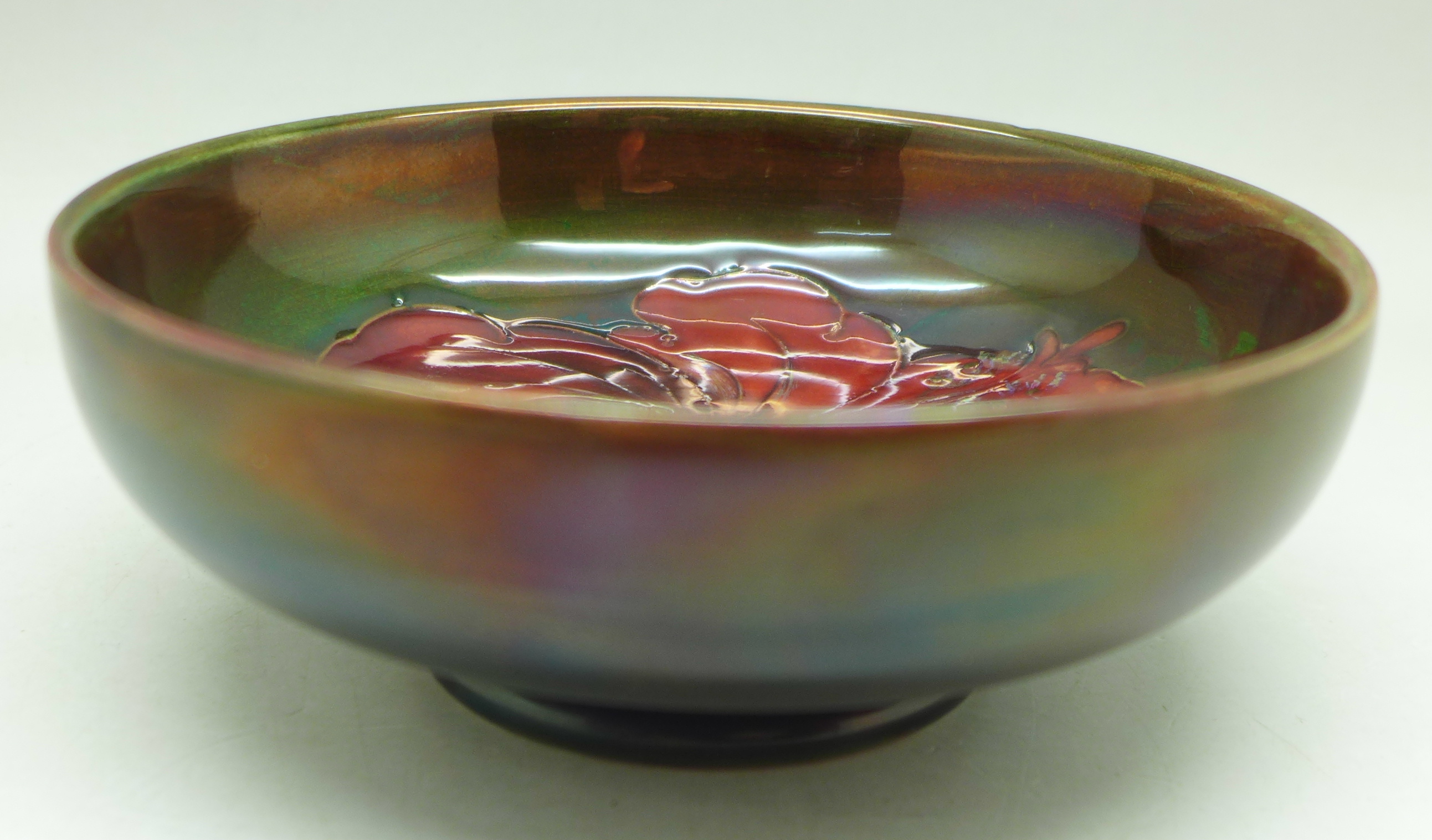 A Moorcroft hibiscus dish, 11.5cm diameter