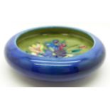 A Moorcroft spring flowers dish, 108mm diameter