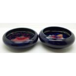 Two Moorcroft dishes, orchid and pomegranate, both crazed, pomegranate with star crack, 11cm