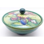 A Moorcroft orchid lidded bowl, 14.5cm diameter