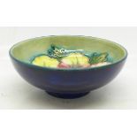 A small Moorcroft hibiscus bowl, with paper label, The Late Queen Mary, 9cm