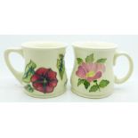 Two Moorcroft mugs, one marked The Ransley Collection, 1996 Collectors Club, (39,40)