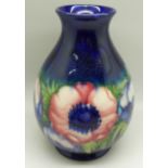 A Moorcroft anemone vase, with signature and impressed marks to the base, 18.5cm