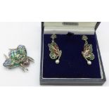 A silver plique-a-jour bug brooch and a pair of butterfly earrings