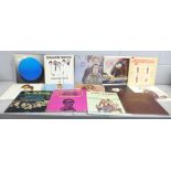 A collection of LP records, Status Quo, Genesis, Phil Collins, Thin Lizzy, Bruce Springsteen,