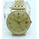 A 9ct gold Omega wristwatch on a 9ct gold bracelet strap, total weight with movement 49.2g