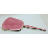 An Art Deco silver and pink enamel hand mirror