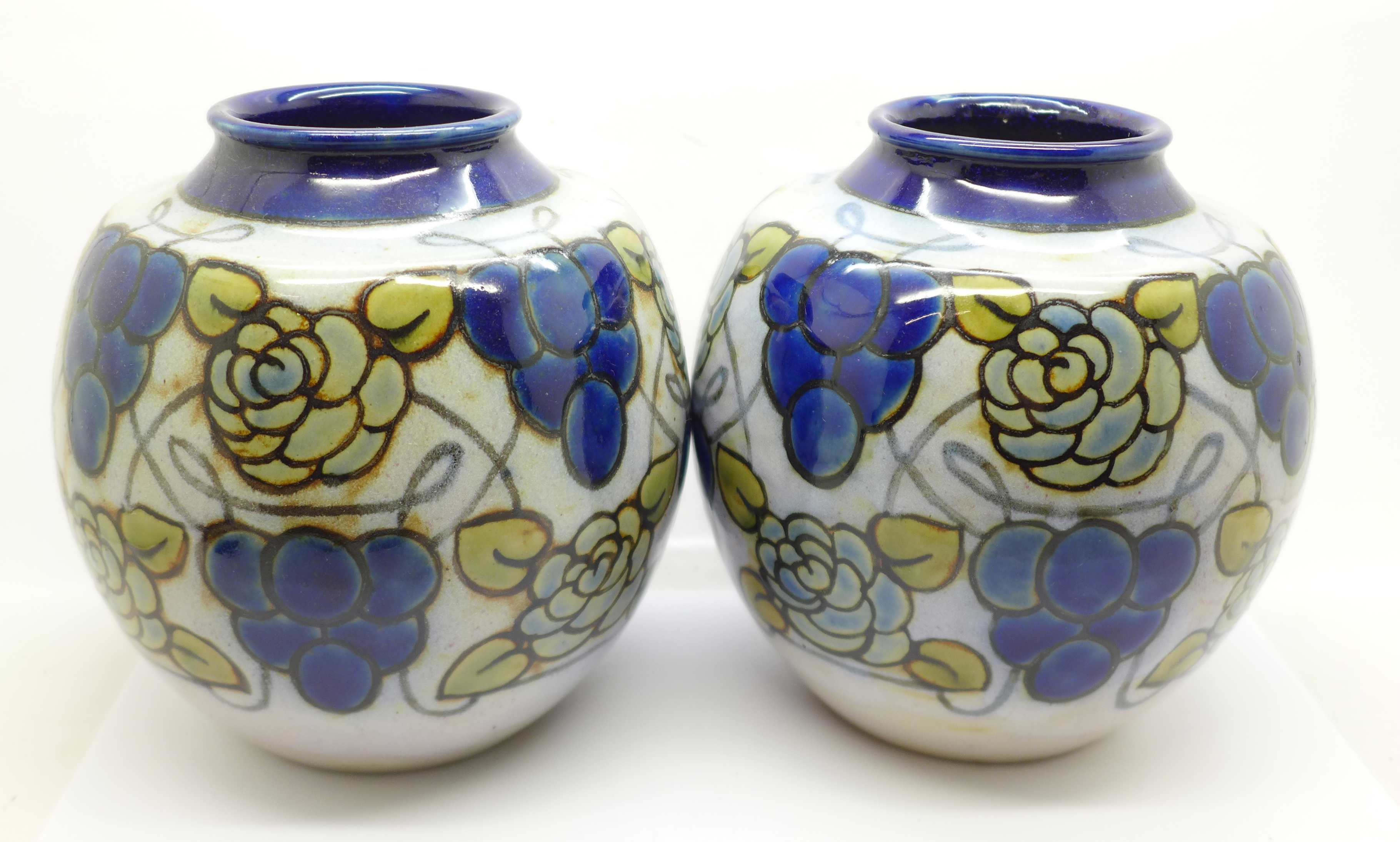 A pair of Royal Doulton stoneware vases, 14cm