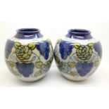 A pair of Royal Doulton stoneware vases, 14cm