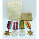 A set of four WWII medals, boxed