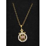 A 925 silver rhodolite garnet and zircon pendant with chain