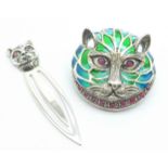 A silver plique-a-jour cat brooch and a silver cat bookmark, (one eye replaced on brooch)