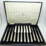 A cased set of six silver handled pastry knives and forks