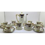 A Kokura Japanese six setting coffee set with cream and sugar, three coffee cans a/f