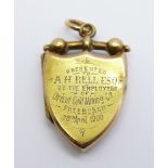 A 15ct gold shield shaped locket with inscription dated 1900, Orient Gold Mining Co., Freeburgh,