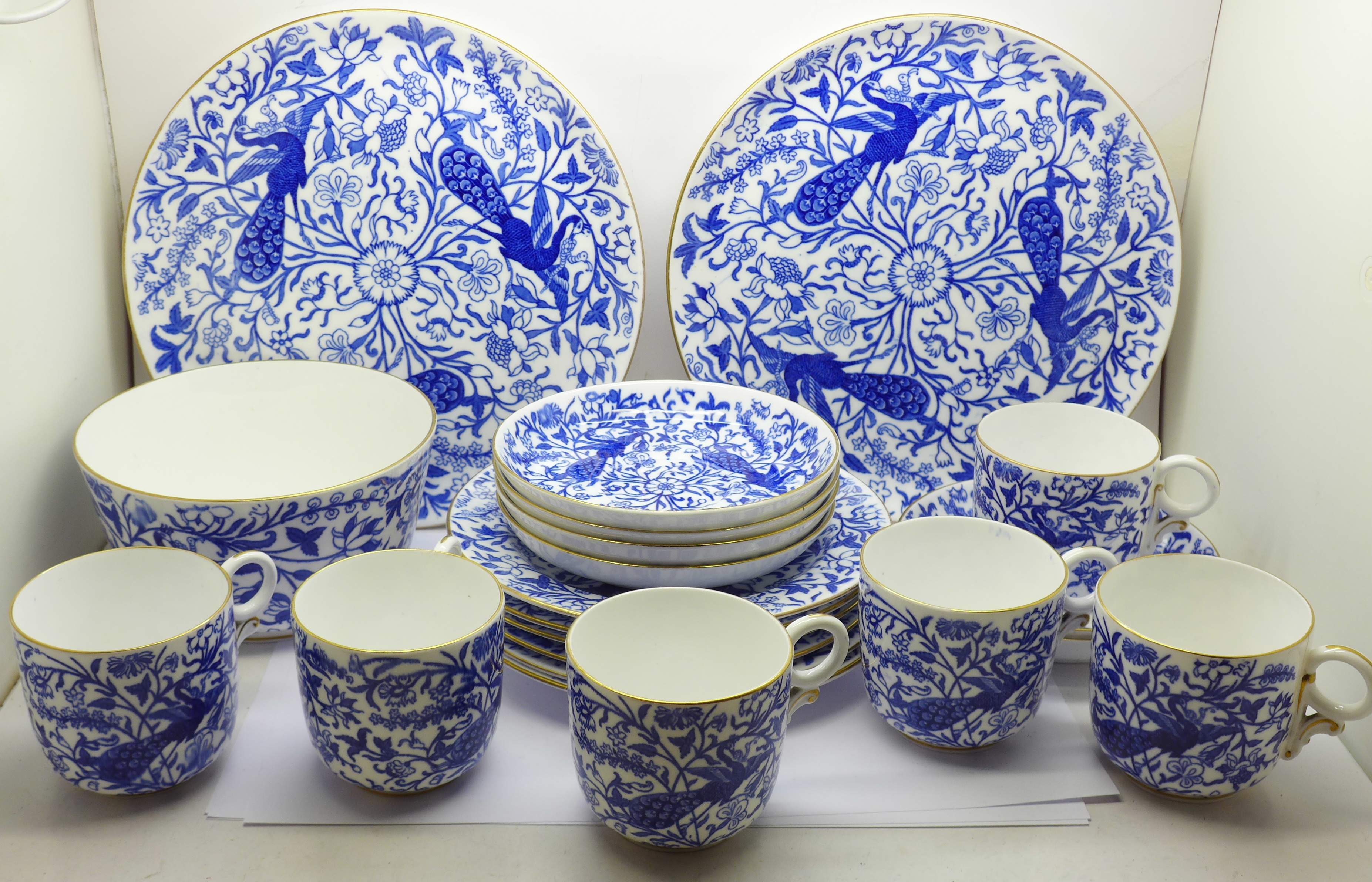 A Derby porcelain six setting tea set with two cake plates and sugar bowl, plates with impressed