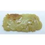 A carved jade panel, 9cm x 4cm