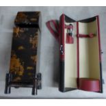 A leather travel wine holder and an oriental style bottle holder **PLEASE NOTE THIS LOT IS NOT