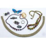 Jewellery including a Victorian silver brooch, a metal set butterfly brooch, a diamante collar, etc.
