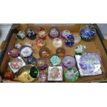 A collection of glass paperweights **PLEASE NOTE THIS LOT IS NOT ELIGIBLE FOR POSTING AND PACKING**