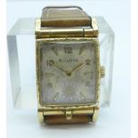 A Bulova 10k rolled gold tank shape wristwatch with subsidiary second hand, 21mm case