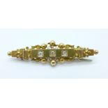 A 15ct gold three stone diamond brooch, Birmingham 1896, 4.5g