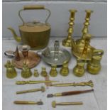 A pair of brass candlesticks, brass weights, glass cutters, copper kettle, etc. **PLEASE NOTE THIS