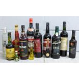 Wines and spirits including a large bottle of Cinzano Rosso, two bottles of Port, a bottle of Rum,