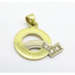 An 18ct gold and diamond pendant, 2.2g