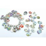 A silver and enamel charm bracelet and loose charms, 82g