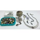 A collection of jewellery including silver