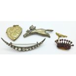 A silver cat brooch, a garnet crown brooch, one other brooch and a plated locket