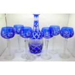 A blue flash cut crystal decanter and six hock glasses