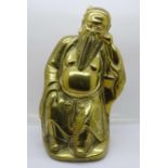 A brass model of a Chinese elder, 23cm