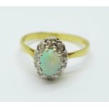 An 18ct gold, opal and diamond cluster ring, 3.3g, R