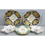 A pair of Meissen shallow bowls, a pair of Bavarian florally decorated dishes and a pair of Minton