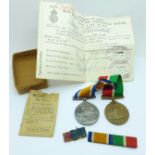 A Mercantile Marine medal and a WWI British War Medal with paper and part box marked to James