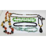 Assorted necklaces including amber and agate