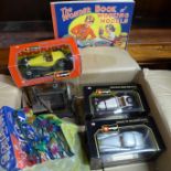Three Burago 1/24 scale die-cast model vehicles, boxed, a child's toy sewing machine, vintage