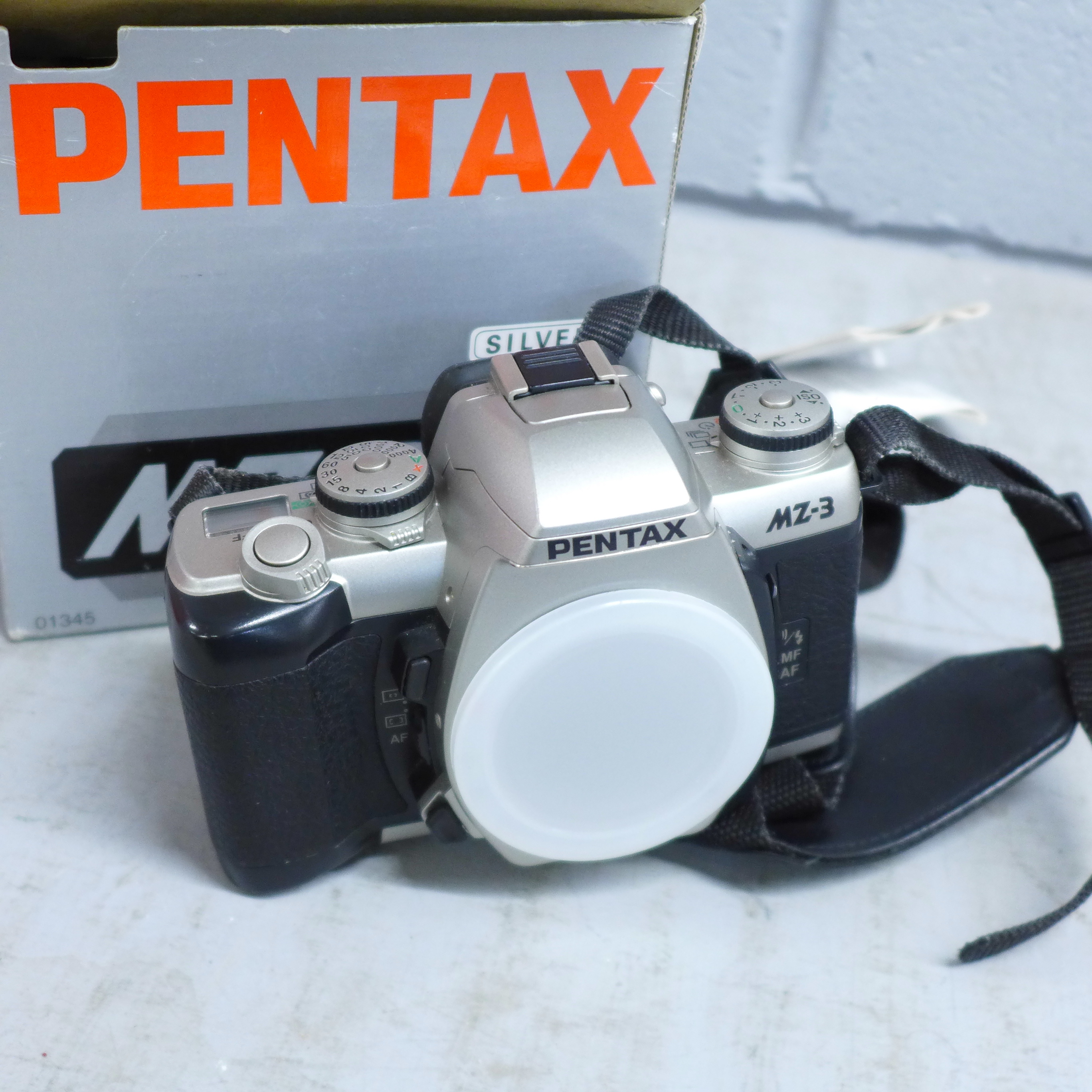 A Pentax MZ-3 camera, two lenses; 43mm F1.9 and 77mm F1.8, a Weston Master V exposure meter (all - Image 4 of 4