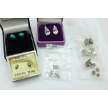 Eight pairs of silver earrings including opal