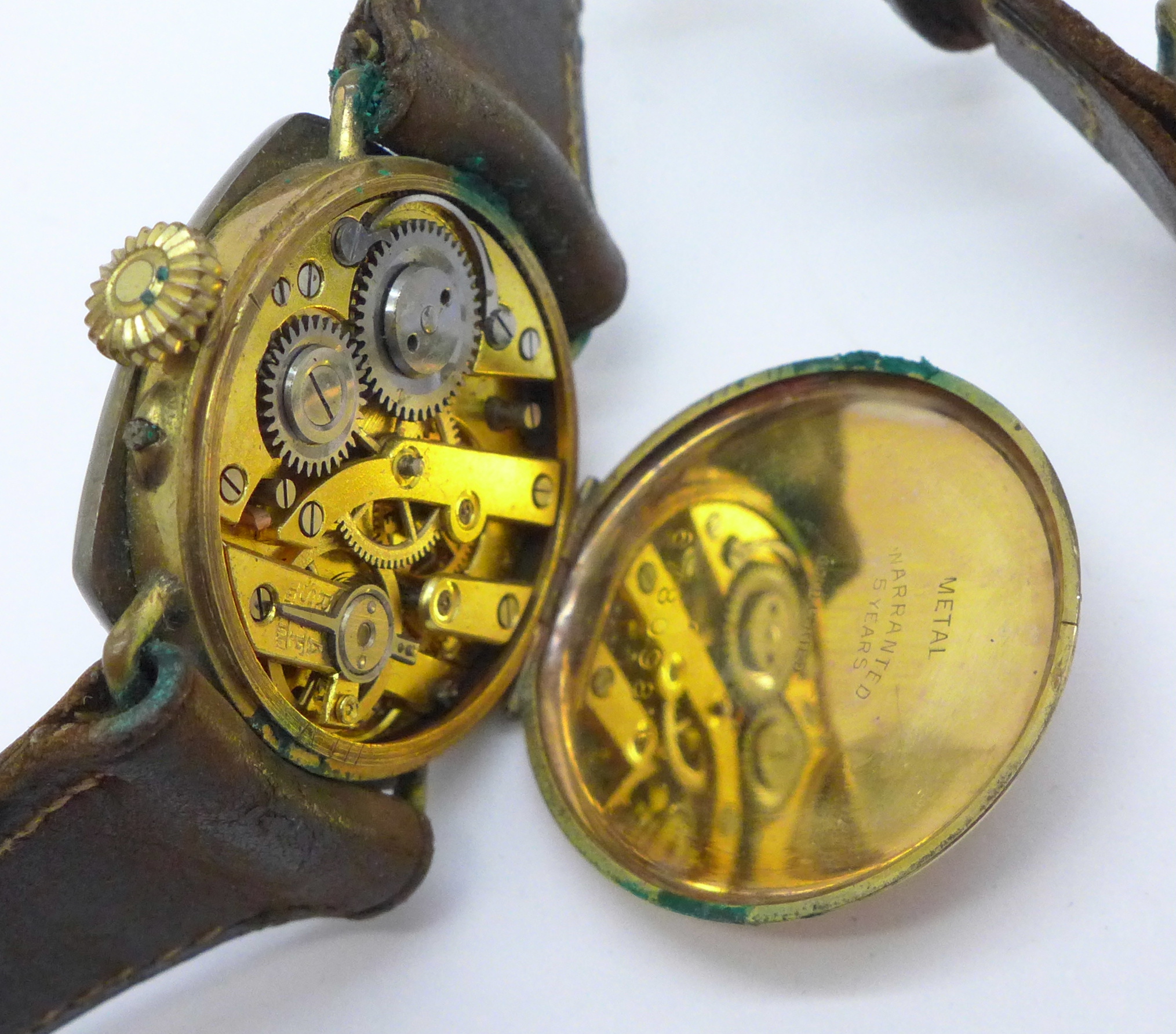 An enamelled wristwatch, glass cracked, the gold plated case back worn, 25mm - Image 5 of 5