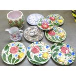 Six Wade hand painted plates, a 19th Century Sunderland lustre jug, a majolica jardiniere, two