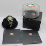 A Tag Heuer Professional 200m quartz wristwatch, with booklet dated 2000, guarantee and two boxes