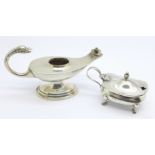 A silver lamp table lighter, (missing wick and top), and a silver mustard, (missing hinge pin), 88g