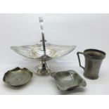 A WMF basket and three Arts and Crafts pewter items