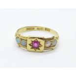 An 18ct gold, opal and ruby ring, 1.9g, K