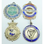 Four silver and enamel fob medals including Stanley & District Football League, enamel a/f, and a