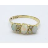 An 18ct gold, opal and diamond ring, Chester mark, date letter worn, 3.2g, U