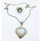 A silver and quartz pendant and chain and a stone set ring, O